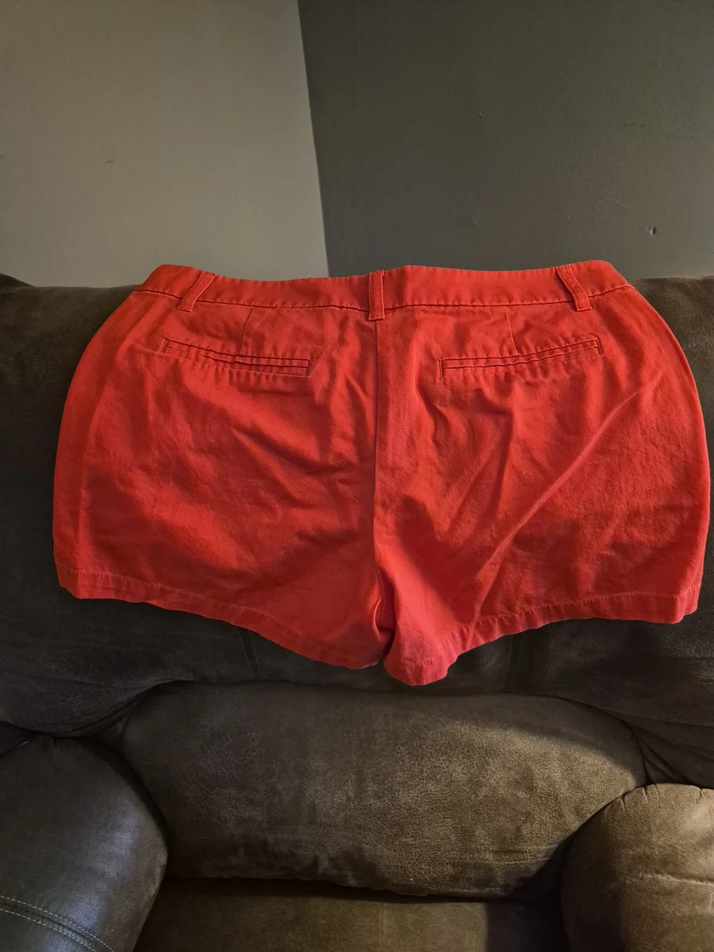 vibrant J.Crew coral 4-inch chino shorts featuring a classic mid-rise fit